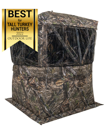 Envy Blind - Mossy Oak® Country DNA® - Front quarter view of blind showing ground skirt and 180° curtain-style viewing area with "shoot-thru" mesh - Best for Tall Turkey Hunters Outdoor Life award winner