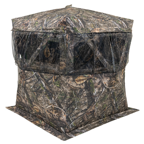 Evade Blind - Mossy Oak® Country DNA® - Front quarter view of blind showing ground skirt and 180° curtain-style viewing area with 